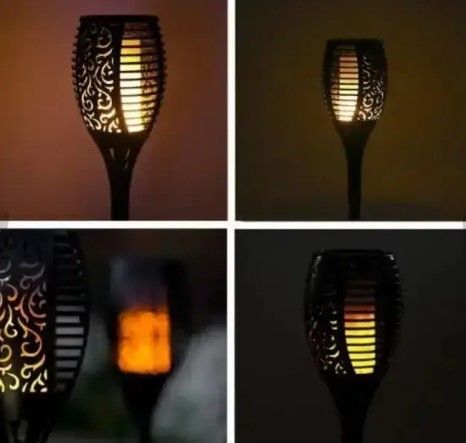 Вуличний ліхтар на сонячній батареї з ефектом полум'я Solar flame led light sensor activated 52 см 0011 фото