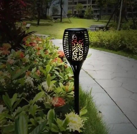 Вуличний ліхтар на сонячній батареї з ефектом полум'я Solar flame led light sensor activated 52 см 0011 фото