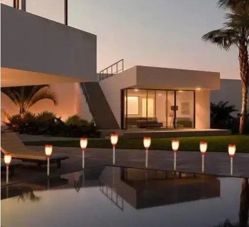 Вуличний ліхтар на сонячній батареї з ефектом полум'я Solar flame led light sensor activated 52 см 0011 фото