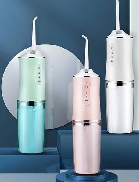 Іригатор портативний Oral Irrigator S3J2 з пульсуючим струменем для чищення зубів і ясен 0930 фото
