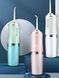 Іригатор портативний Oral Irrigator S3J2 з пульсуючим струменем для чищення зубів і ясен 0930 фото 7