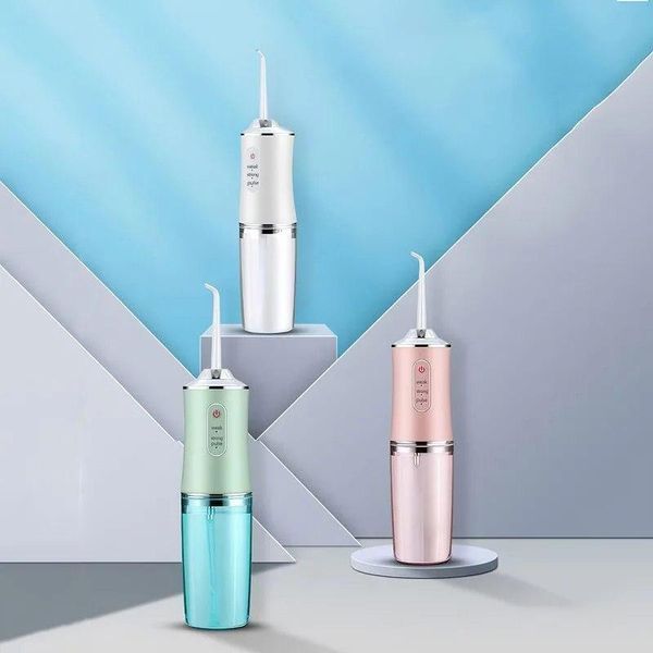 Іригатор портативний Oral Irrigator S3J2 з пульсуючим струменем для чищення зубів і ясен 0930 фото