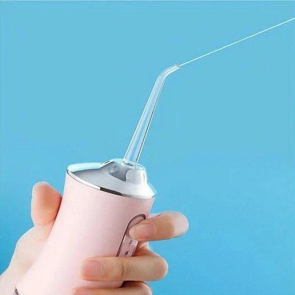 Іригатор портативний Oral Irrigator S3J2 з пульсуючим струменем для чищення зубів і ясен 0930 фото